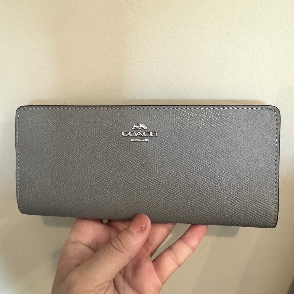 Coach wallet with tons of card holder space and pockets